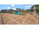 Spacious backyard featuring a large pool, gazebo, and outdoor kitchen, perfect for entertaining at 1710 Bridgets Ct, Kissimmee, FL 34744