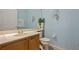 Charming bathroom featuring classic fixtures and decor with soft paint at 1710 Bridgets Ct, Kissimmee, FL 34744