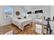 Bright bedroom featuring laminate floors, natural light, and a comfortable space at 1710 Bridgets Ct, Kissimmee, FL 34744
