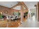 Spacious dining room with hardwood floors, decorative arches and natural light at 1710 Bridgets Ct, Kissimmee, FL 34744