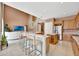 Open-concept kitchen flows into a great room and features breakfast bar seating at 1710 Bridgets Ct, Kissimmee, FL 34744