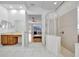 Spacious main bathroom with walk-in shower, dual vanity, and access to the main bedroom at 1710 Bridgets Ct, Kissimmee, FL 34744