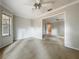 Comfortable bedroom featuring a ceiling fan and large windows for natural light at 1869 Eagles Rest Dr, Apopka, FL 32712