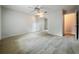 This bedroom has a ceiling fan and mirrored closet at 1869 Eagles Rest Dr, Apopka, FL 32712