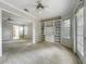 Bright bedroom with built-in shelving and French doors, perfect for relaxing at 1869 Eagles Rest Dr, Apopka, FL 32712
