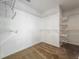 Walk-in closet with carpet, shelving and hanging racks at 1869 Eagles Rest Dr, Apopka, FL 32712
