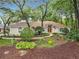 Exterior view of a home with mature trees at 1869 Eagles Rest Dr, Apopka, FL 32712