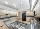 Spacious kitchen with granite countertops, stainless steel appliances, and light wood cabinets at 1869 Eagles Rest Dr, Apopka, FL 32712