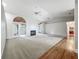 Bright living room with a fireplace and access to the outdoors at 1869 Eagles Rest Dr, Apopka, FL 32712
