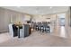 Bright, open dining area seamlessly flows into the modern kitchen, perfect for entertaining and Gathering gatherings at 203 Taylor Groves Dr, Lake Wales, FL 33853
