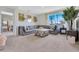 Cozy living room featuring a plush sectional sofa, creating an inviting and comfortable atmosphere at 203 Taylor Groves Dr, Lake Wales, FL 33853