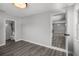 Neutral bedroom leading to an ensuite bathroom and bright living area at 2105 9Th Ne St, Winter Haven, FL 33880