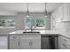 Bright kitchen island with stainless steel appliances and sleek countertop at 2105 9Th Ne St, Winter Haven, FL 33880