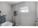 Room showing breaker box, a small window and mechanicals at 2105 9Th Ne St, Winter Haven, FL 33880