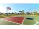 Community basketball court with a bright color scheme, perfect for residents of all ages at 2916 Simile St, Kissimmee, FL 34746