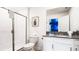 Clean bathroom with a walk-in shower, modern vanity, and bright lighting at 2916 Simile St, Kissimmee, FL 34746