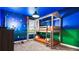 Themed bedroom with custom bunk beds, unique wall art, and a playful, imaginative design at 2916 Simile St, Kissimmee, FL 34746