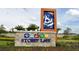 Entrance sign for Story Lake featuring flowers and blue skies at 2916 Simile St, Kissimmee, FL 34746