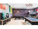 This entertainment room features a TV, pool table, bunk beds and themed Harry Potter decor at 2916 Simile St, Kissimmee, FL 34746
