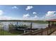 Beautiful lake view with kayak launch and colorful kayaks, perfect for outdoor enthusiasts at 2916 Simile St, Kissimmee, FL 34746