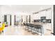 Bright, open kitchen featuring a large island with bar seating and modern appliances at 2936 Protagonist St, Kissimmee, FL 34746