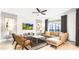 Comfortable living room showcasing modern decor, a large sectional, and outdoor access at 2936 Protagonist St, Kissimmee, FL 34746