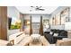 Modern living room featuring a large TV, comfortable seating, and neutral color palette at 2936 Protagonist St, Kissimmee, FL 34746