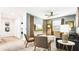 Cozy living room with modern furniture, large TV, and ambient lighting at 2936 Protagonist St, Kissimmee, FL 34746