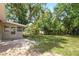 The expansive backyard offers lush greenery and the perfect setting for outdoor living at 326 Evergreen Ct, Apopka, FL 32712