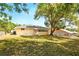 A sweeping view of a well-maintained backyard, perfect for outdoor activities and relaxation at 326 Evergreen Ct, Apopka, FL 32712