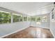 Bright sunroom filled with windows offering lots of natural light and pleasant views at 326 Evergreen Ct, Apopka, FL 32712