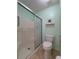 Full bathroom with tiled shower at 32900 Crooked Oaks Ln, Leesburg, FL 34748