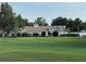 Charming clubhouse overlooking the pristine greens, perfect for relaxation and social gatherings at 32900 Crooked Oaks Ln, Leesburg, FL 34748