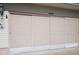Garage with sliding screen door at 32900 Crooked Oaks Ln, Leesburg, FL 34748