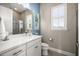 Bright bathroom with a quartz countertop, framed art, and ample light at 3647 Farm Bell Pl, Lake Mary, FL 32746