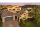 A well-manicured home displays a tiled roof, a spacious three-car garage, and brick paver driveway at 3647 Farm Bell Pl, Lake Mary, FL 32746