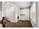 Hallway with french doors, cabinetry and natural light at 3647 Farm Bell Pl, Lake Mary, FL 32746