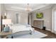 Neutral colored main bedroom with carpet and tray ceilings at 3647 Farm Bell Pl, Lake Mary, FL 32746