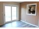 Bright and airy living room with sliding glass doors and an open view to the kitchen at 3713 N Econlockhatchee Trl, Orlando, FL 32817