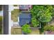 Bird's-eye view of a home with fenced yard, showcasing the roof and surrounding landscape at 376 Orange Ave, Longwood, FL 32750