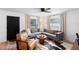 Cozy living room with ample natural light, stylish furniture, and a welcoming atmosphere at 376 Orange Ave, Longwood, FL 32750