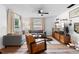 Comfortable living area with stylish furnishings, a sectional sofa, and abundant natural light at 376 Orange Ave, Longwood, FL 32750