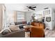 Inviting living room with stylish decor, a comfortable sectional, and plenty of natural light at 376 Orange Ave, Longwood, FL 32750