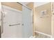 Clean shower stall with sliding glass doors and safety bars at 428 Tarrson Blvd, Lady Lake, FL 32159