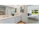 Bathroom with double sink vanity, and a view into the bedroom at 5075 Marshelder, Apopka, FL 32712