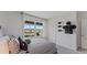 Well-lit bedroom with sports decorations, and a window with a view at 5075 Marshelder, Apopka, FL 32712