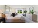Bright bedroom with a large window, neutral colors, and plenty of natural light at 5075 Marshelder, Apopka, FL 32712