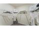 Walk-in closet with wire shelving and hanging rods, offering ample storage at 5075 Marshelder, Apopka, FL 32712