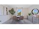 Bright home office with a modern desk, comfortable chairs, and ample natural light at 5075 Marshelder, Apopka, FL 32712