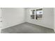 Carpeted bedroom with bright natural light and neutral color palette at 5210 Marshelder, Apopka, FL 32712